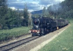 Class 741 Crosti boiler 2-8-0 No 320 on the line between Fortezza - Sandido in the Italian Dolomites area taken in 1973