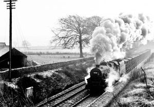On a freezing cold 20th December 1967, ex LMS Black 5 No. 45353 heads North from Carnforth with Presflo cement wagons. Photo: Michael Smyth.