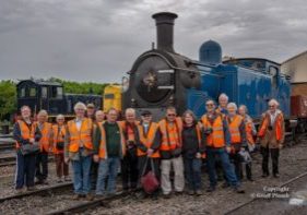 Members of the RCTS Watford Branch group pose with McIntosh Caledonian Railway ‘439’ Class 0-4-4T (aka ‘Standard Passenger Class’) No. 419 in the shed yard during a guided tour of the loco shed and facilities at Toddington on the GWSR. 13:11¾, Sunday 2nd June 2019. The loco was not serviceable after a failure, though a wonderful sight! Photo © Geoff Plumb