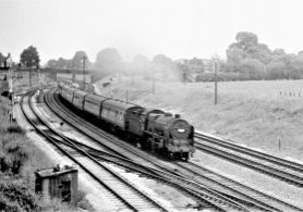 Edge Hill ‘Patriot’ No. 45515 'Caernarvon' accelerates in fine style past Tuffley Junction on the 10.20 am Liverpool to Bournemouth, 13th June 1959