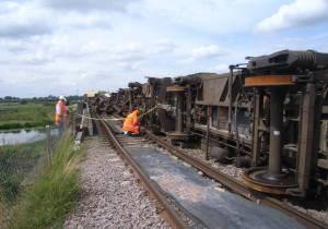 They shouldn’t be like that! Our presenter hard at work investigating why, following a freight train derailment at Ely Dock Junction in 2007. Image courtesy: RAIB