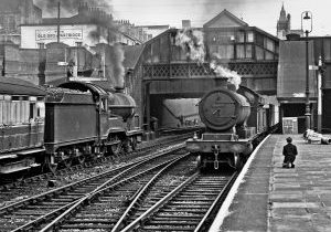 Nottingham Victoria Summer 1959. 62661 on 1749 Sheffield to Leicester passes 63884 on northbound goods. David  M Swale.