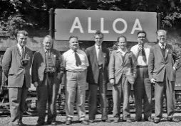 ‘The Seven Lairds of Alloa’, taken during the SLS/RCTS ‘Scottish Tour’,   at Alloa on 17th June 1960 in which can be seen from left to right : John Edgington, Henry C. Casserley, Bert Hurst, David S. Smith, unidentified person, Dick Tompkins and Jack Faithfull. Image Credit: Photographer Unknown
