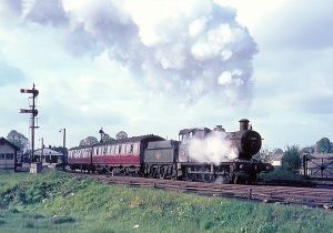 2251 Class 0-6-0 No.2210 is seen departing from Stratford-on-Avon with the 8.43am to Leamington Spa General in the summer of 1964.