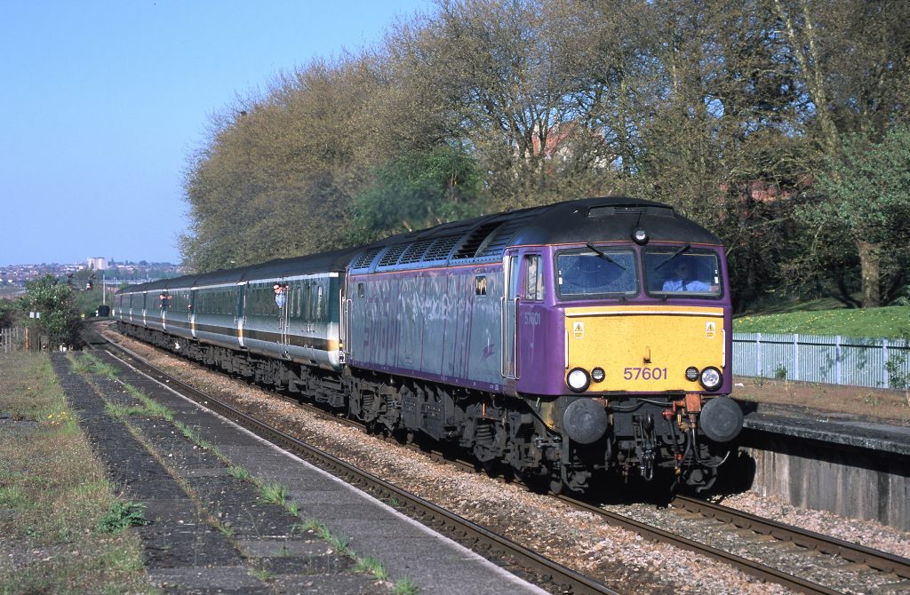 During the Winter 2001/Spring 2002 timetable, prototype ETS-fitted class 57 conversion 57601 regularly worked a Monday to Friday diagram comprising the 06.30 Plymouth to Paddington and the 15.42 Paddington to Exeter St. David's, both via Bristol. On 24th April 2002, the down working is pictured passing Bedminster as it accelerates away from Temple Meads.   Image credit: Stewart Jolly