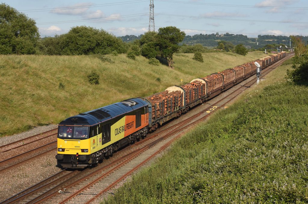 Pilning before electrification. Immaculately turned-out 60002 heads down towards the Severn Tunnel with 6M51, the 16:34 TThO Exeter Riverside to Chirk timber on 2nd July 2015.  Image credit: Stewart Jolly