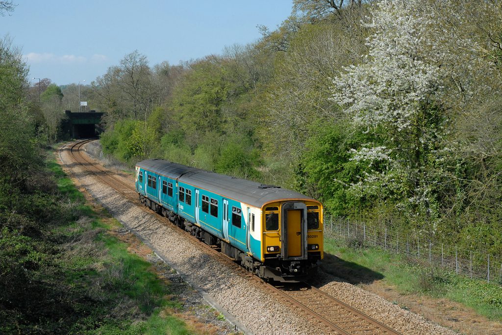 During the 2000s First Great Western was chronically short of DMUs, leading to periodic sub-leases from other operators.  In this view taken on 19th April 2009, 150281, one of several class 150/2s on loan to FGW from Arriva Trains Wales at the time, has just departed from Sea Mills working the 14.52 (Sun) Avonmouth to Bristol Temple Meads service. Image credit: Stewart Jolly