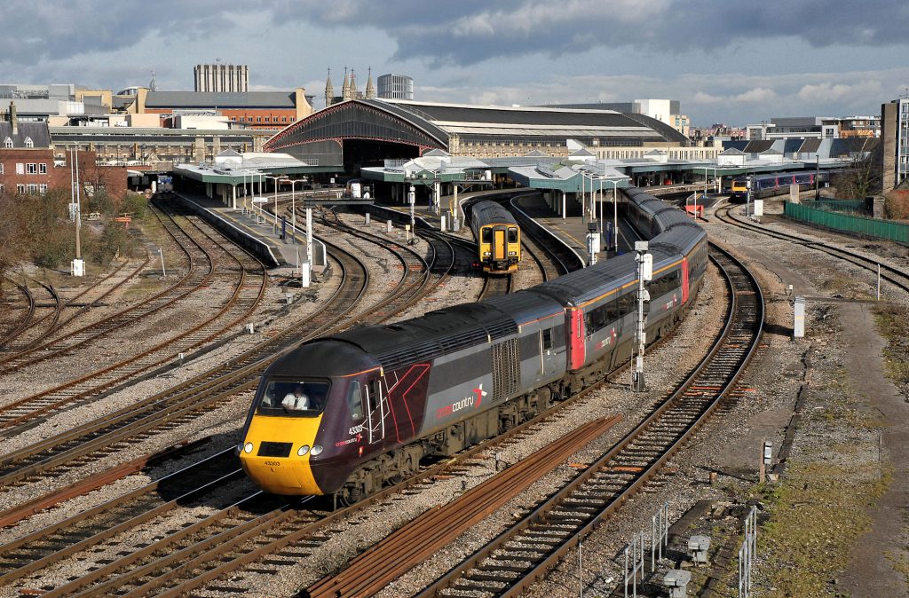 Two services for Plymouth are pictured departing simultaneously from Bristol Temple Meads on 26th February 2010. 43303 heads the slightly-delayed 06.00 from Leeds, while 150239 forms the 09.00 stopping train from Cardiff Central.  Although this might be regarded as a 'modern' image, the motive power pictured here has all been superseded: Cross Country services to the South West are now worked exclusively by Voyagers, while IETs have not only replaced the Paddington-bound HST in the background, but have also taken over most of the stopping services between Cardiff and the South West - levelling up indeed!  Image credit: Stewart Jolly