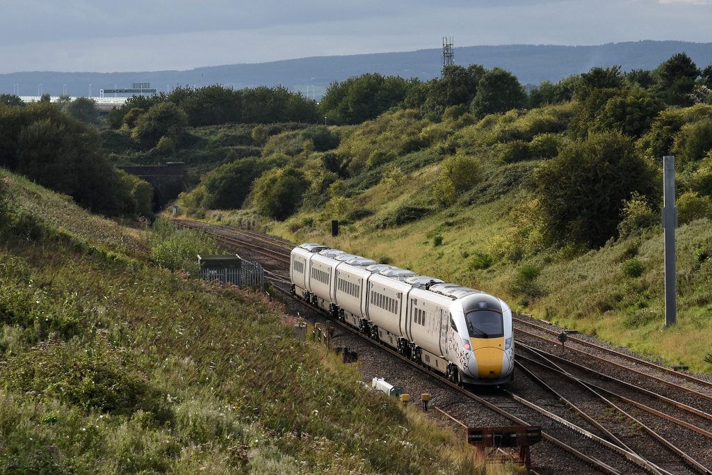 A second view of 800005 on 24th August 2017 at Pilning, descending towards Ableton Lane Tunnel on a test run from Reading depot to Newport.  The works livery contrasts well with the lineside vegetation, unlike the GWR dark green currently carried by the fleet.  Image credit: Stewart Jolly