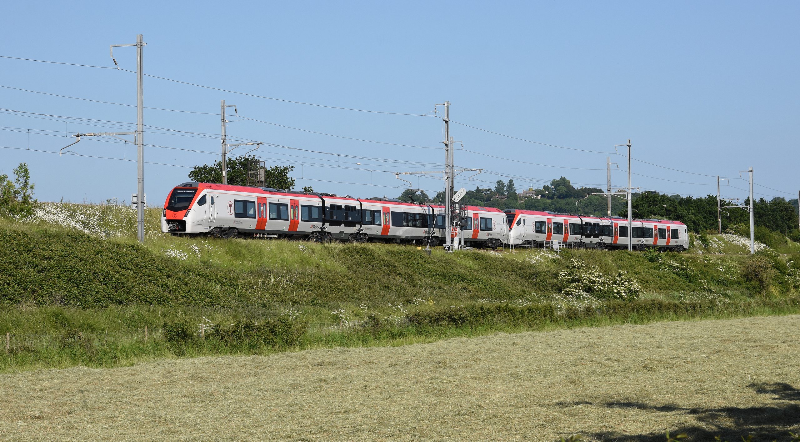 Throughout the Summer of 2023, Transport for Wales Stadler class 756 units have worked test/mileage accumulation runs between Cardiff and Swindon.  756007 & 756006 are pictured on 1st June on the split level track between Patchway and Pilning, running as 3Q41, 16.14 Swindon to Cardiff Canton Sidings.  Image credit: Stewart Jolly