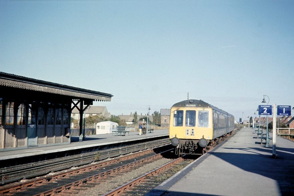19701003-MABLETHORPE-Arrives-after-shunting-across-on-09 Having crossed over to the Up line, the Branch train draws in to Mablethorpe's platform 2 to form the 11.00 departure to Willoughby where it will connect into Northbound and Southbound trains on the main line. Platform 1 was formerly the North-facing bay but fell out of use after closure of the line to Louth. Photo: John Tolson, courtesy Trevor Davis.