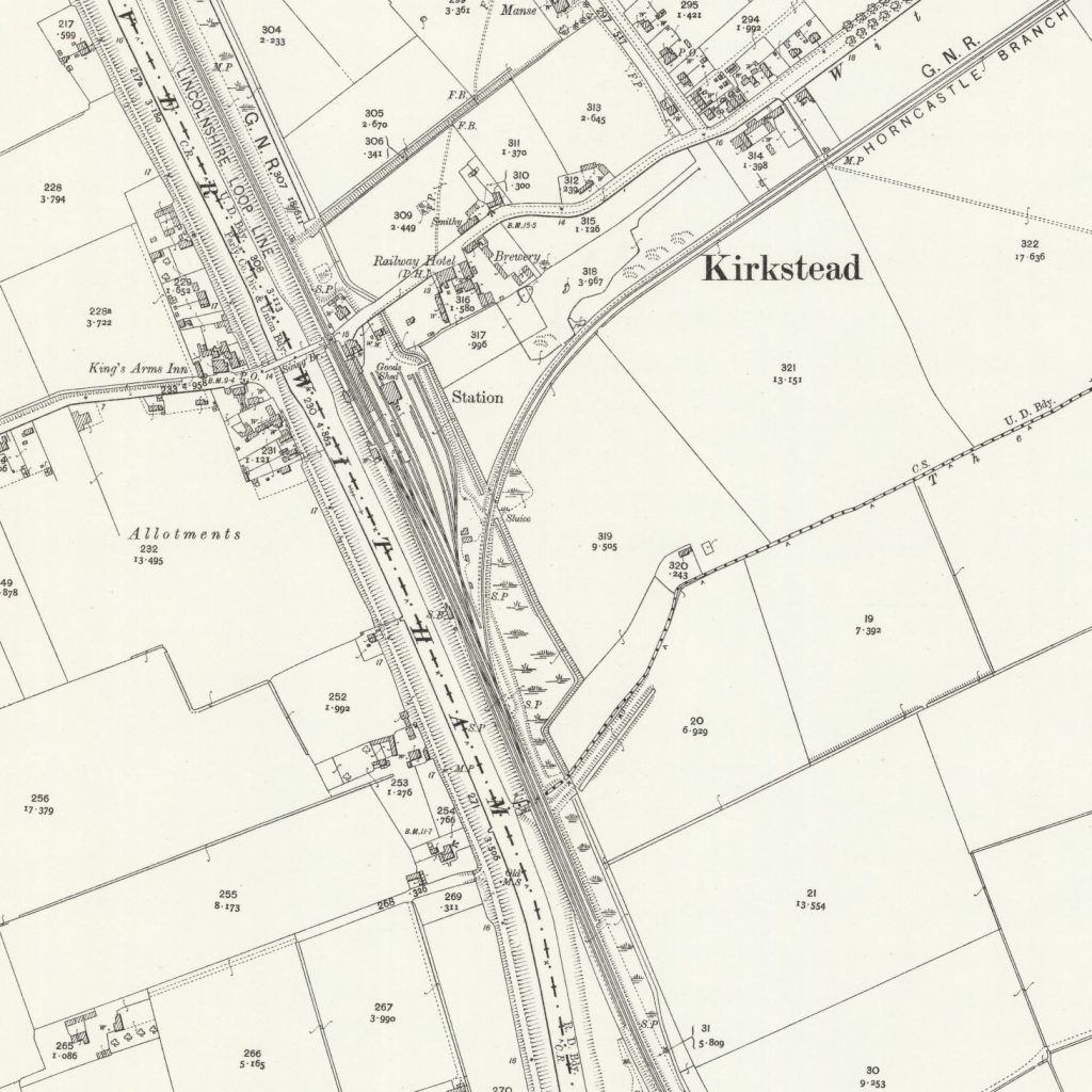 19050000-WOODHALL-Jc-Map-Composite-E2W 1905 25 inch-to-the-mile Ordnance Survey map of Woodhall Junction showing the two through platforms and the Horncastle bay platform with the yard to the East. The Horncastle Branch was accessed from the station and the yard via a reversal in the headshunt, although the trackwork did allow through running off the Branch onto the Up line. Just over a mile to the South of the station was Coningsby Junction, the point at which the 1913 'New Line' to Bellwater Junction diverged from the Boston line (the 'Lincolnshire Loop Line', as shown on the map). Copyright CC-BY (NLS) https://maps.nls.uk/