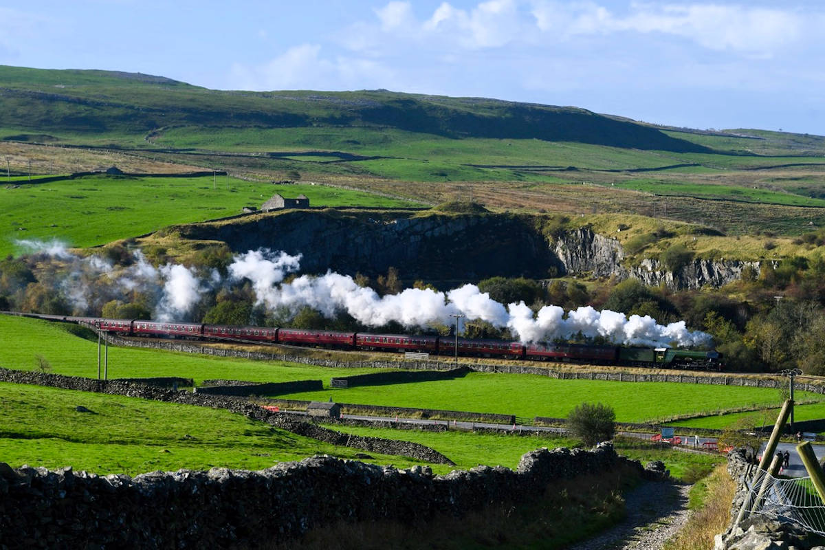 Steam and the Settle and Carlisle Line are a magical combination! On Saturday 14th October 2023, 4472 'Flying Scotsman' heads North through Helwith Bridge with the Railway Touring Company's Derby-Carlisle 'Hadrian', which it took from Hellifieid to Carlisle. Photo: Michael Smyth.