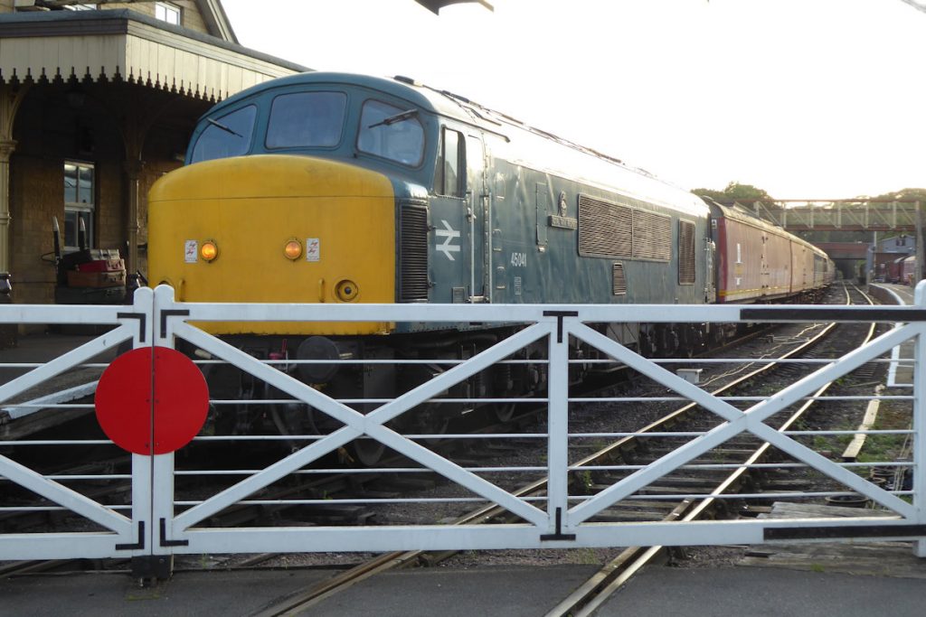 20240928-WANSFORD-45041-Royal-Tank-Regiment80327-George-James80337-Brian-White-19 Catching the evening sun at Wansford on Saturday 28th September 2024, Class 45/0 No. 45041 'Royal Tank Regiment' waits departure with the 19.00 'Night Mail'. The train ran to Peterborough, where refreshments were loaded, then back to Yarwell Junction and after running round again, back to Wansford. All-in-all, an excellent evening and highly recommended. Photo: Alan Jones.