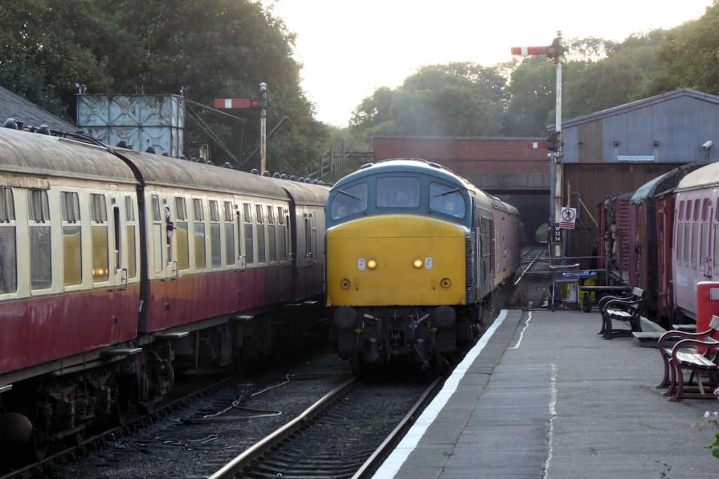20240928-WANSFORD-45041-approaches-with-8032780337-to-work-19 Beautifully-preserved Class 45 No. 45041 'Royal Tank Regiment' draws sorting carriages 80327 'George James' and 80337 'Brian White' (both former TPO staff) through Wansford station before reversing back onto the stock in the adjacent platform to form the 19.00 'Night Mail' special on Saturday 28th September 2024. Photo: Alan Jones.