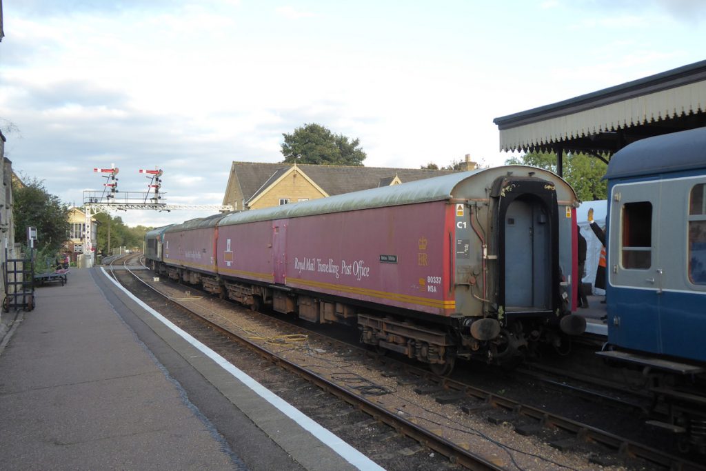 20240928-WANSFORD-450418032780337-propel-onto-19 NSA vehicles 80337 (Dia. 729) and 80327 (Dia. 728) are reversed onto the passenger stock at Wansford on the Nene Valley Railway's 'Night Mail' event on September 28th 2024. There were six BR Mark 1 sorting carriage diagrams in total: Diagram 720 (80300-80305 and 80309-80318), 721 (80306-80308), 728 (80319-80327), 729 (80328-80338), 731 (80339-80355) and 726 (80356-80395), reflecting the changing requirements for collection and deposit of mail bags (arms, nets or neither), sorting (different frame sizes and arrangements) and security (different window sizes and configurations). Photo: Alan Jones.