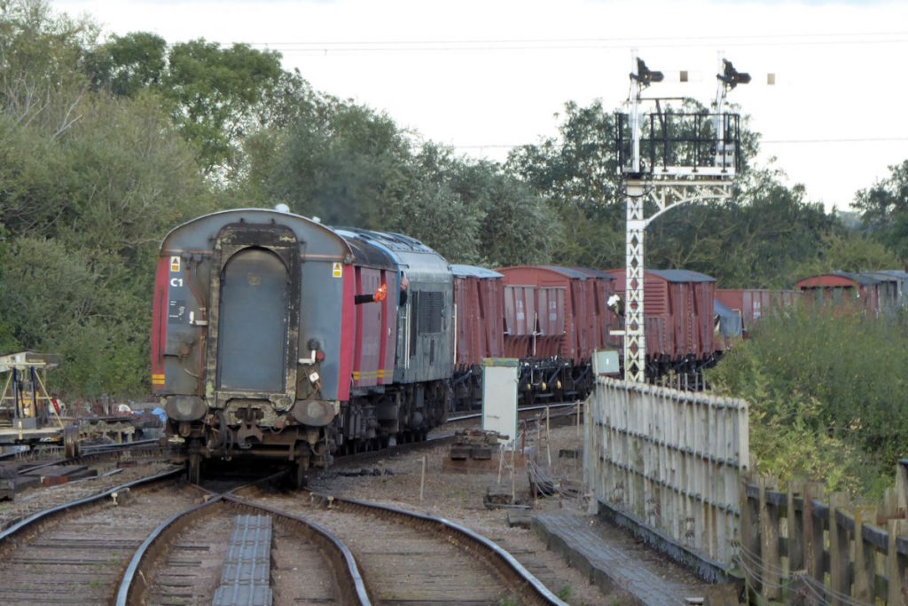 20240928-WANSFORD-450418032780337-propel-onto-19 In a scene that bears some similarity to the arrival of the Rosslare Boat Train at Limerick Junction, Class 45/0 No. 45041 'Royal Tank Regiment' has passed through Wansford station and is now backing its two sorting carriages (80337 and 80327) onto a rake of Mark 1 stock to form the 19.00 'Night Mail' departure on September 28th 2024. Photo: Alan Jones.