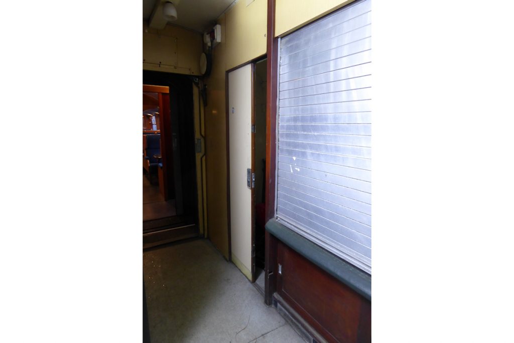 20240928-WANSFORD-80337-Brian-White-19 Between the Registered Letter Frame and the end of the carriage was a high security cupboard, used for carriage of cash, cheques and postal orders. The sliding door was metal and extremely sturdy. It also had in it a small hole of around a couple of inches diameter so that, in emergency, the door could be locked and the keys pushed through the hole. This feature was instigated after the Great Train Robbery of 8th August 1963, when £2.61 million (circa £50 million in today's money) was stolen from the Up Special TPO at around 3am. Photo: Alan Jones.
