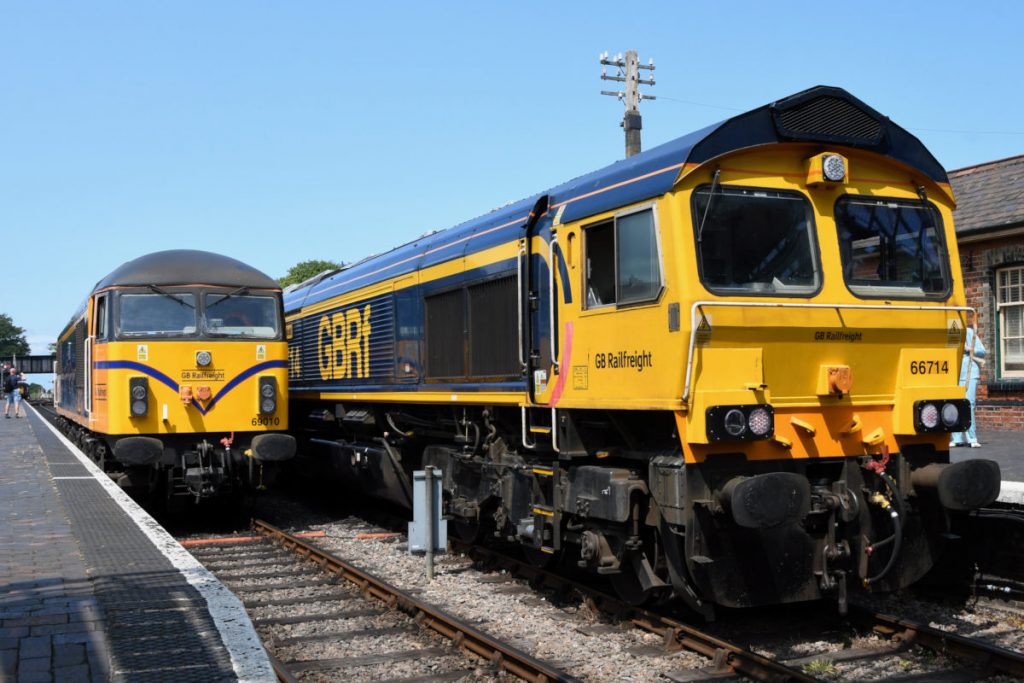 20250615-SHERINGHAM-6671469010-Diesel-Gala-Michael-Smyth-AW GB Railfreight's support to the North Norfolk Railway's 2025 Diesel Gala was very welcome and was a fantastic example of a modern railway operating company working with a leading preservation society. GBRf Class 66 No. 66714 'Cromer Lifeboat' and Class 69 No. 69010 'North Norfolk Railway 1975-2025' occupy the platforms at Sheringham on a beautifully sunny June 15th 2025. Photo: Michael Smyth.