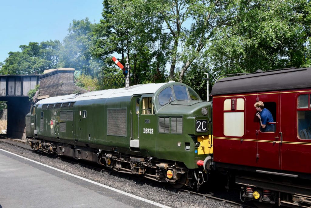 20250615-SHERINGHAM-D6732-departs-for-Holt-Diesel-Gala-Michael-Smyth-AW As the owner of D6732, Alistair Barham can be rightfully proud of this magnificent locomotive as it perfectly re-creates its 1962 appearance. Apart from the B4 bogie, the rolling stock also fits the period and together the pair make a fine sight at Sheringham on June 15th 2025. All that is needed is a rake of fish vans, which together with D6732 will make the perfect 3V05, Hull to Plymouth fish. Photo: Michael Smyth.