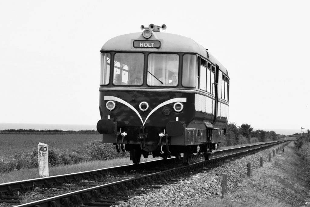 20250615-WEYBOURNE-E79960-from-Sheringham-on-Diesel-Gala-Michael-Smyth-AW Waggon Und Maschinenbau four-wheel railbus E79960 approaches Weybourne from Sheringham on June 15th 2025 during the North Norfolk Railway's 2025 Diesel Gala. Milepost forty-and-a-half was measured from South Lynn, including the reversal at Melton Constable. The official mileage from South Lynn to Weybourne station was 40 miles and 31 chains, so the half-mile point would have been 9 chains East of the station, which may be just to the West of the milepost. Photo: Michael Smyth.