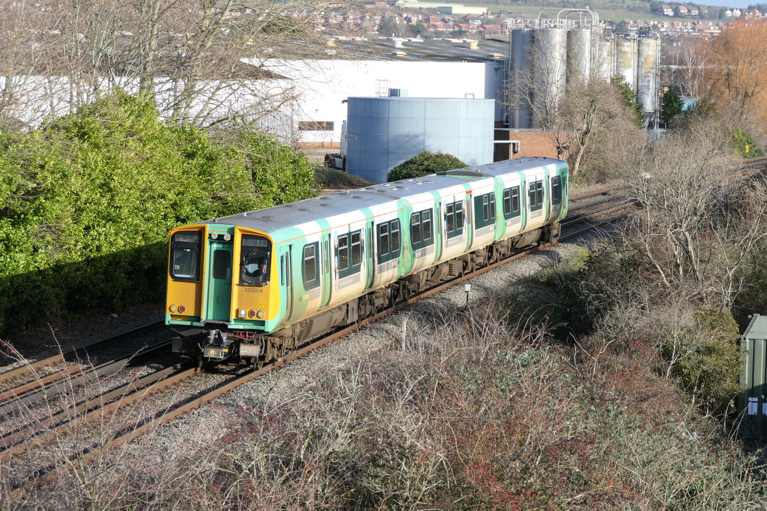 313 204 Approaching Portcreek Junction forming the 10:02 Brighton to Portsmouth Harbour. 23 December 2019.