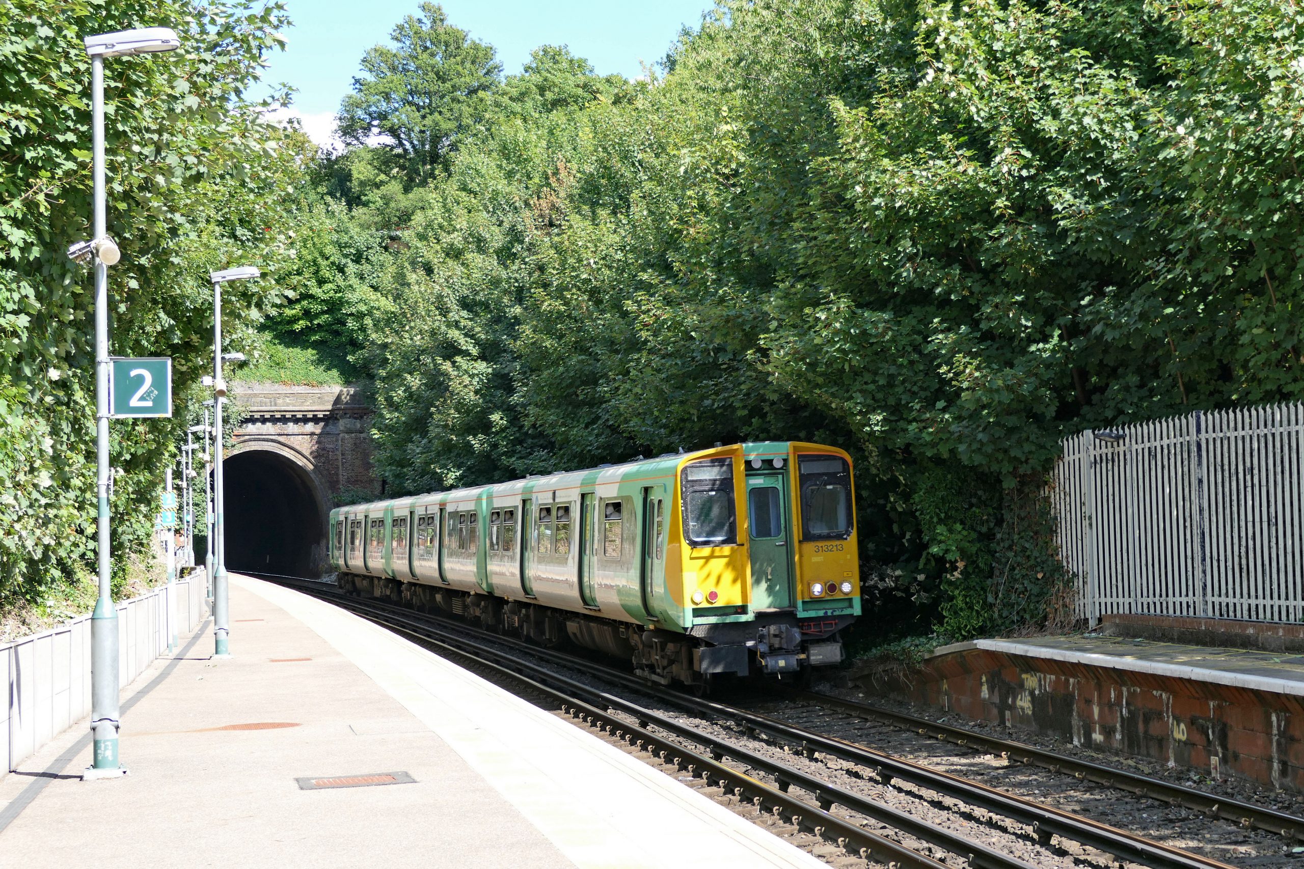 313 213 approaching London Road Brighton with the 14:25 Seaford to Brighton service. 05 August 2022.