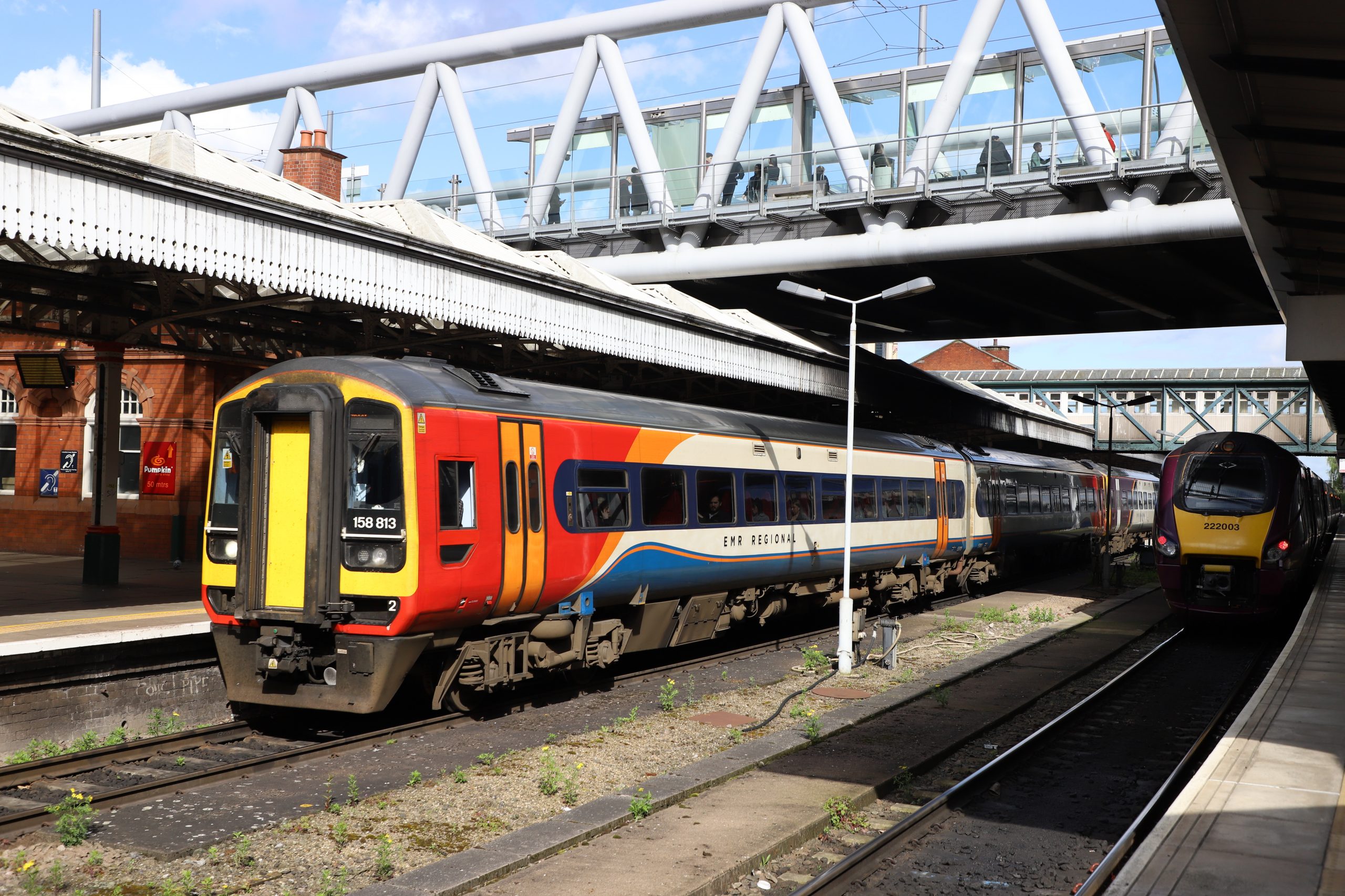 Units 158813 & 158773 leaving Nottingham at 15:50 with the 12:56 service from Norwich to Liverpool; on the right is unit 222003 with the 15:50 service to St Pancras : Image credit - Brian Roberts