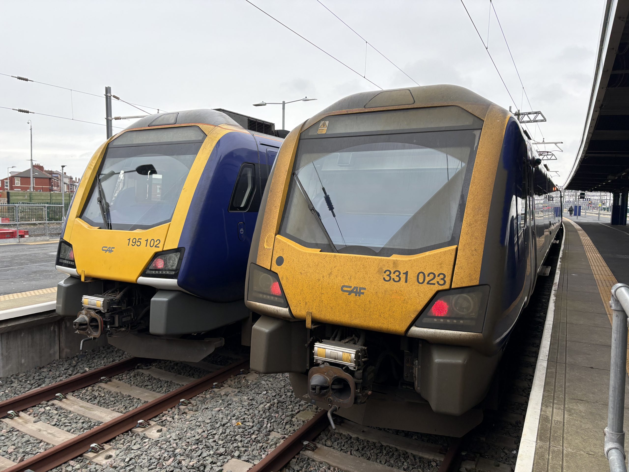 Same units different power. CAF units 195102 & 331023 at Blackpool North having arrived from York & Manchester Airport respectively : Image credit - Peter Hughes