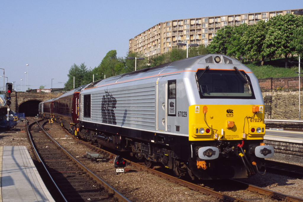 May 10 2006 Sheffield station. After waiting in one of the centre roads for over 30 mins the EWS company train consisting of DVT 82146 + coaches 10546 + 10211 +11039 was propelled north at 17:00 by 67029. Image Credit : Enid Vincent