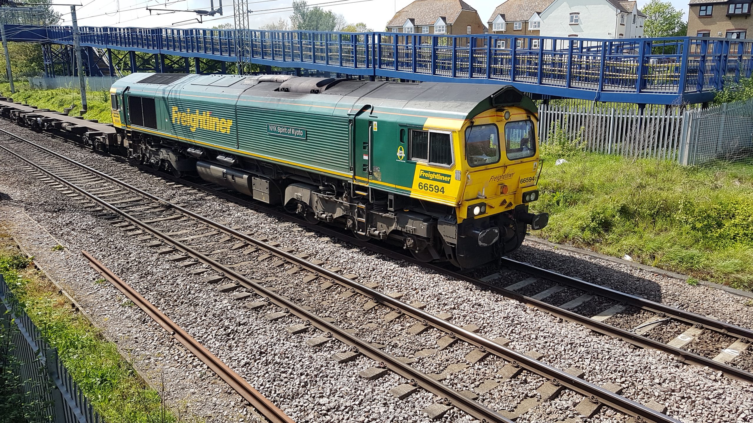 66594 heads a Wentlog to Felxistowe intermodal at Witham