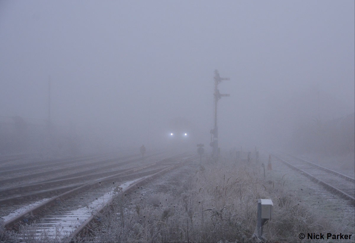 6T63 Saxmundham to Whitemoor Road on 11 December 2022 Fog and freezing conditions are a big favourite of mine when photographing trackside. On this day I was in luck with both as GBRF 66798 crawled into view on the approach to March station. Nick Palmer