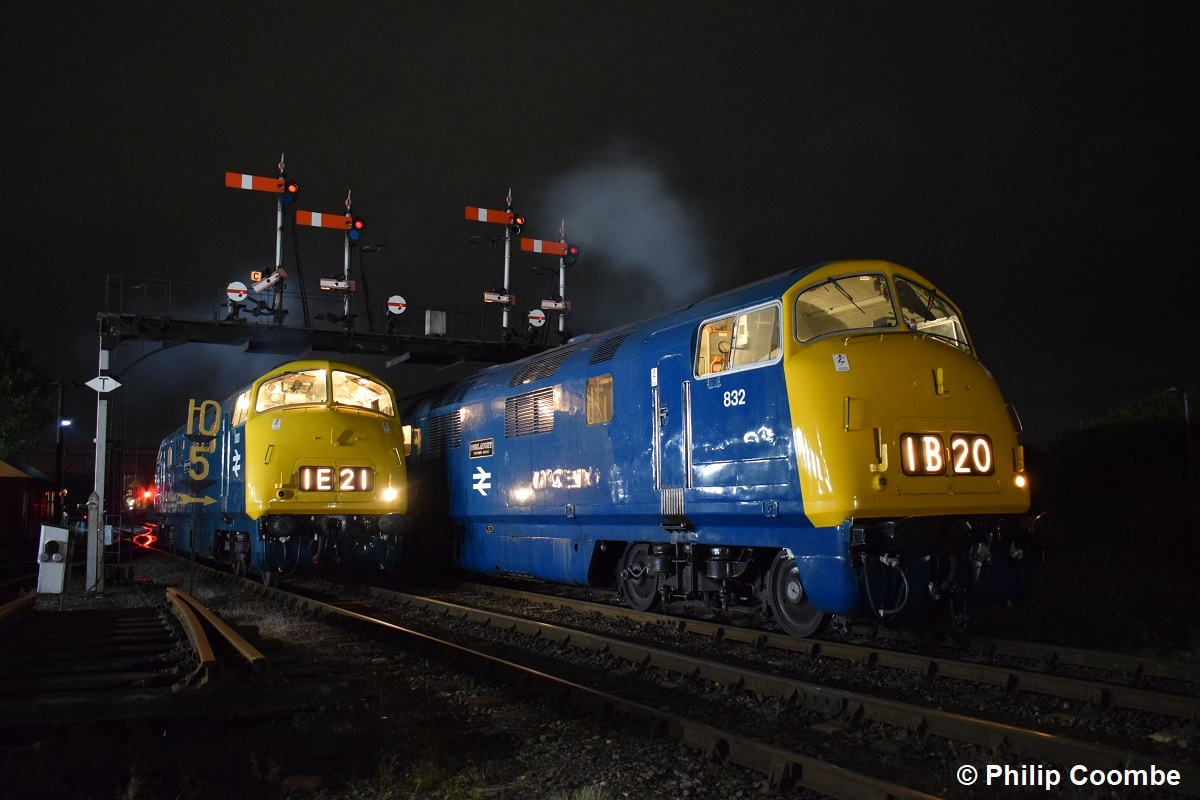 Warships D821 and 832 rest under the signal gantry at the Severn Valley Railway  on 6th October 2023. Philip Coombe