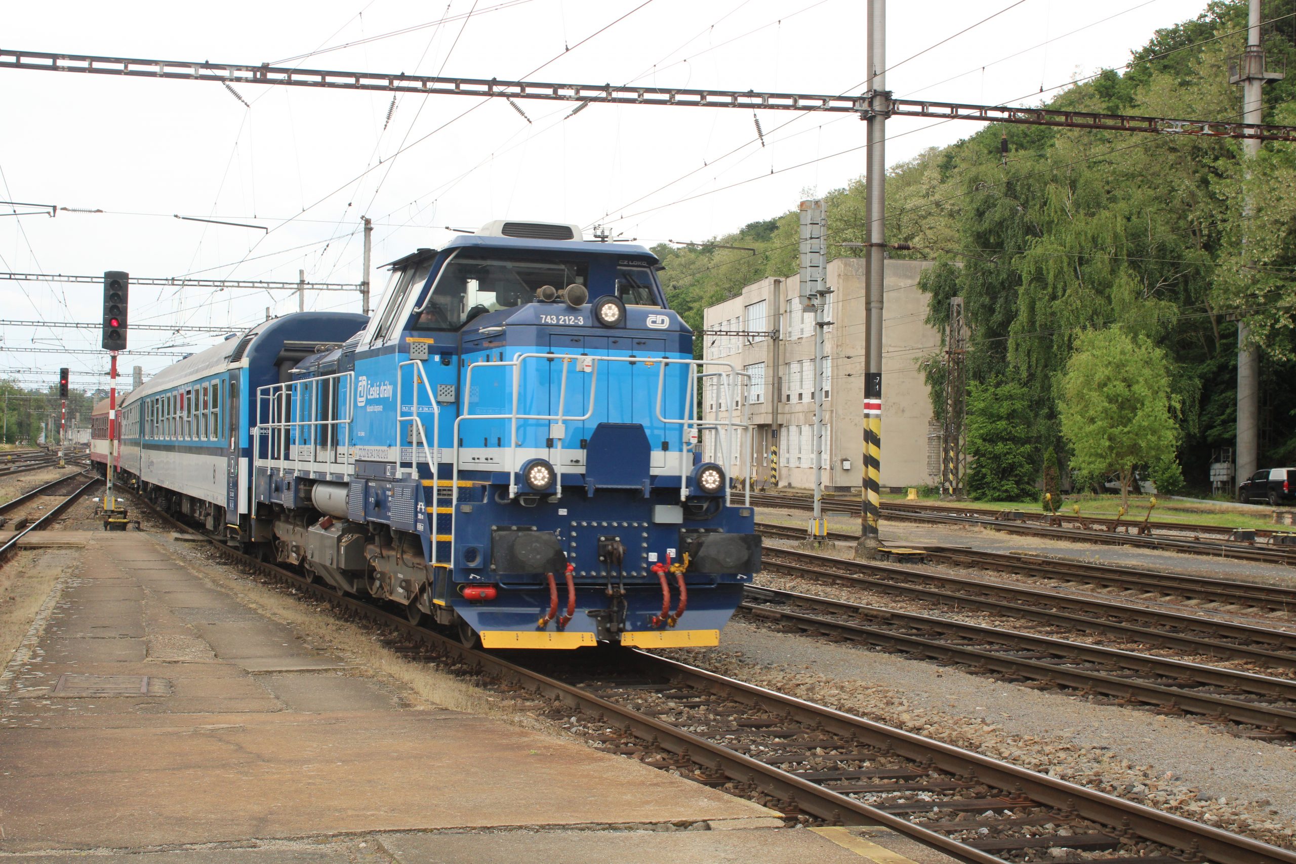 Ollive S - IMG_1608 - CD 743-212 - Kralupy n.Vltavou 02 June 2025 CD 743-212 arriving at Kralupy n.Vltavou on 02 June 2025 with train SP1494 the 16:22 from Praha Masarykovo nádraží to Slaný. This is a CZ Loco Effishunter 1000M rebuilt from 742.383 for CD passenger services. Photo: S Ollive.